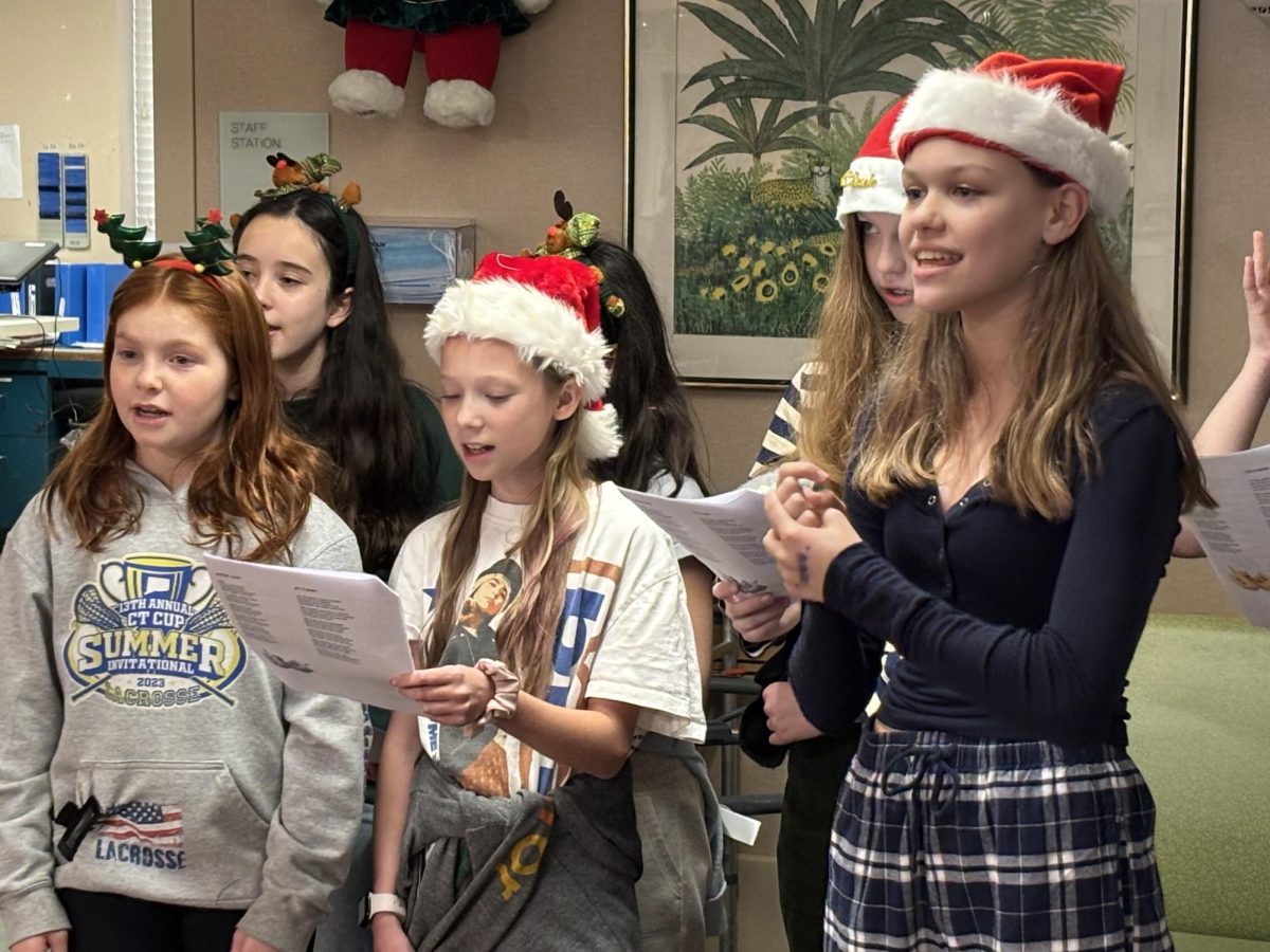 Members of the No Place For Hate Club sand Christmas carols this past holiday season at the Cabrini Nursing Home.